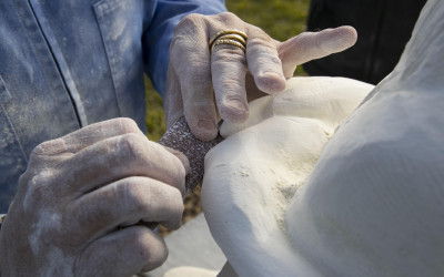 Donald Gibson works on one of his sculptures.